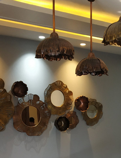 New Friends Colony wall art installation designed by Sahil & Sarthak Poppy Mirrors